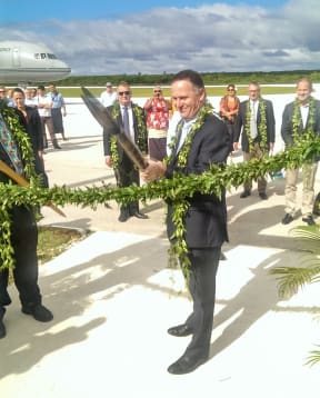 John Key opened a new airport terminal.