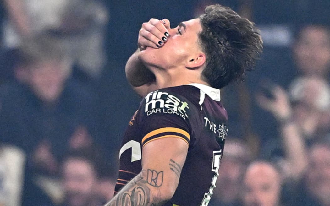 Reece Walsh of the Broncos celebrates after scoring a try during the round 27 NRL match between Brisbane Broncos and Melbourne Storm at Suncorp Stadium, on September 04, 2025, in Brisbane, Australia.