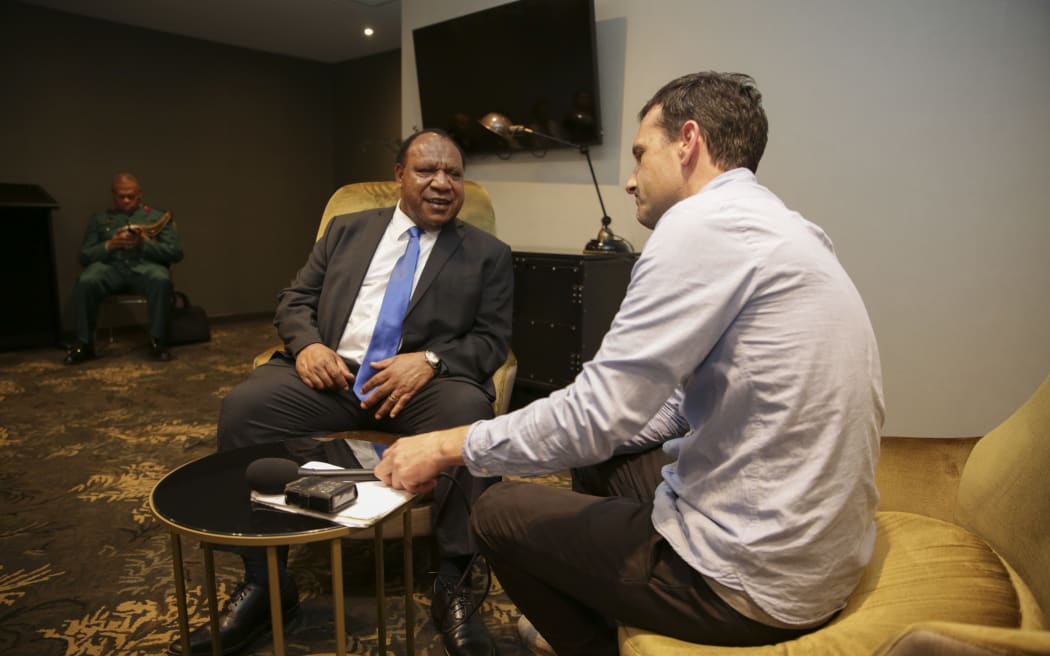 PNG Minister for Foreign Affairs and Immigration, Rimbink Pato & RNZ Pacific's Johnny Blades