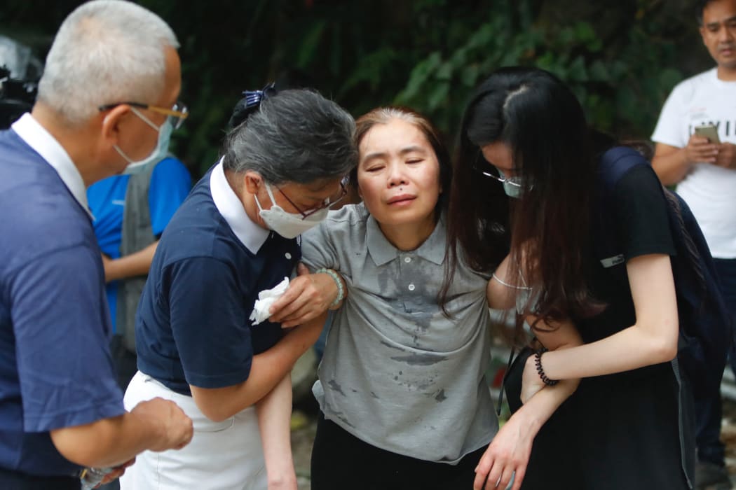 About a hundred people take part during a memorial ceremony mourning for the deaths of the train derailment, in Hualien, Taiwan, on April 4, 2021 killing at least 50 and injuring dozens which took place on 2 April.