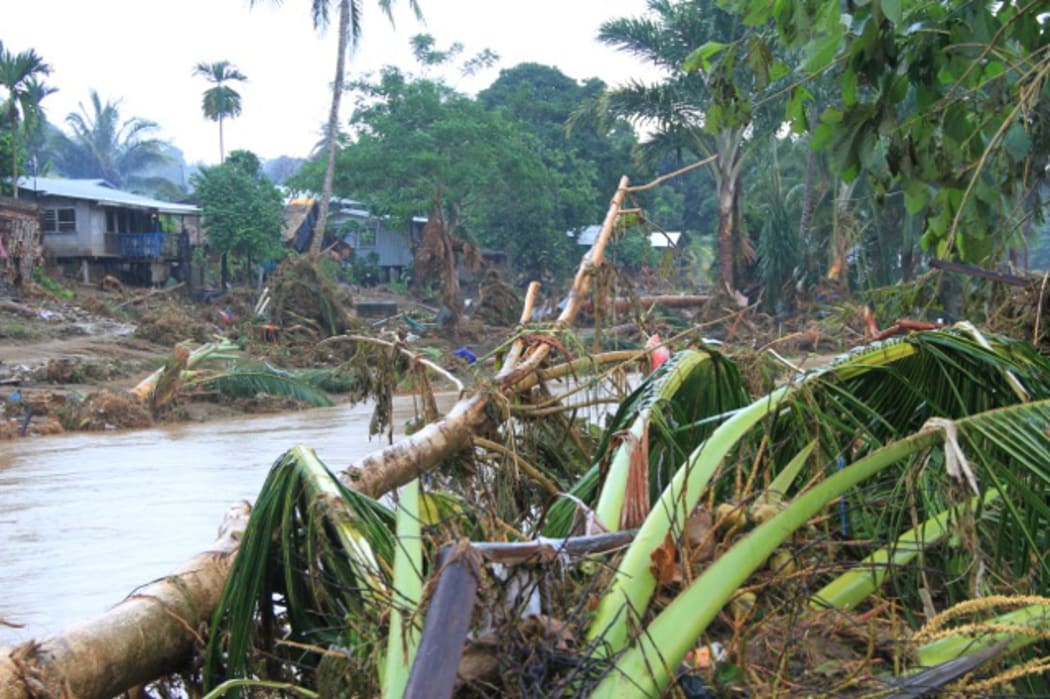 080414. Photo Save the Children. Hope fades for missing while destroyed sewerage system and water shortages spark waterborne disease fear in floodhit Solomon Islands.