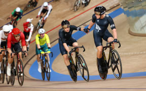 Tokyo 2020 Olympics - 07/08/2021 - Cycling Track - Izu Velodrome, Izu, Japan - Campbell Stewart and Corbin Strong of New Zealand in action during the men's Madison final
