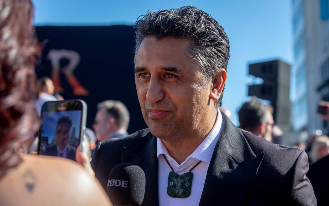 New Zealand actor Cliff Curtis speaks to media on the red carpet at the premiere of Avatar: Fire and Ash in Wellington on 13 December, 2025.