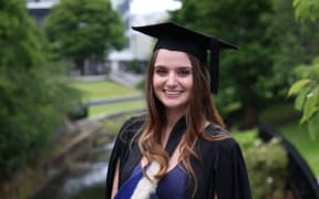 Anna Blair in her Bachelor of Science graduation regalia