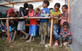 Emergency temporary school for displaced Papuan children in Wamena.