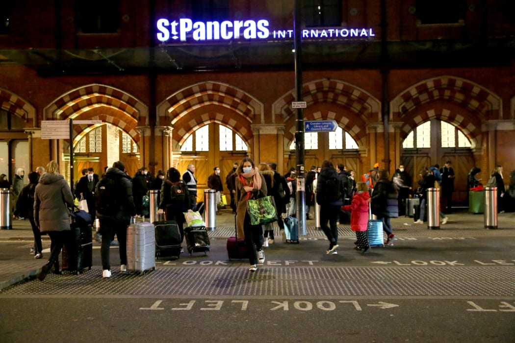 People waiting at St Pancras International train station in London before the travel restriction imposed by France on travelers from the UK to prevent the spread of the Omicron variant of Covid-19 on 17 December 2021.