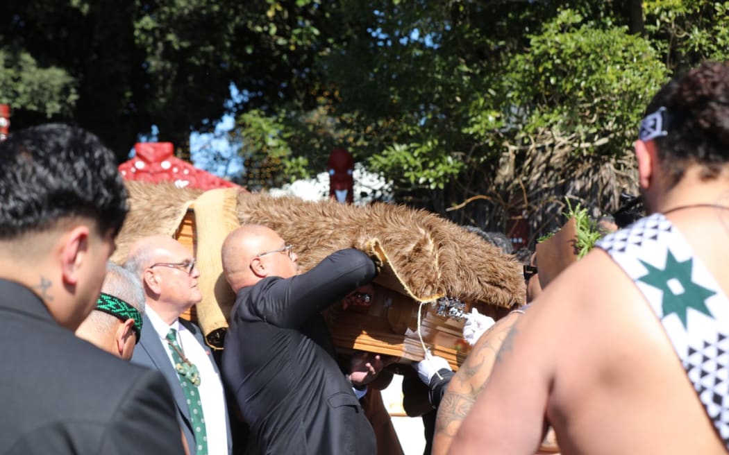 Kiingi Tuheitia Pootatau Te Wherowhero VII's body is transferred to a hearse.