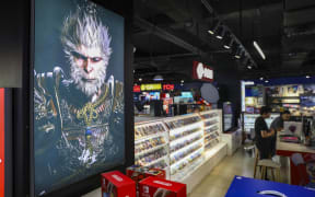 People experience the game "Black Myth: Wukong" in Shanghai, China, 20 August, 2024. (Photo by stringer / ImagineChina / Imaginechina via AFP)