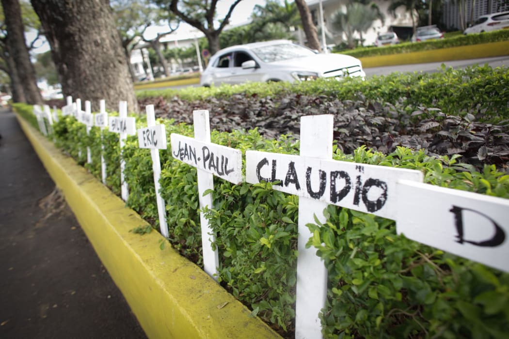 Crosses bearing names of victims set in front of Papeete Court house, on the first day of the trial of Air Moorea company, 11-years after the crash of one of its aircrafts in which 20 people were killed.