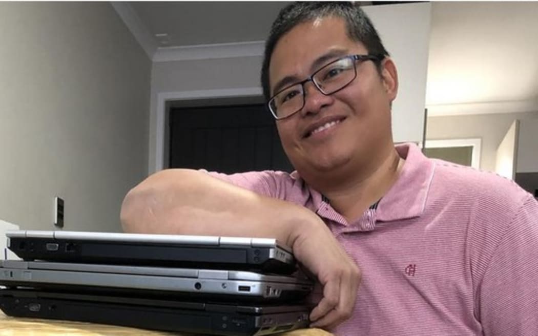 Ronan Yabut with a package ready to be sent to the Philippines.