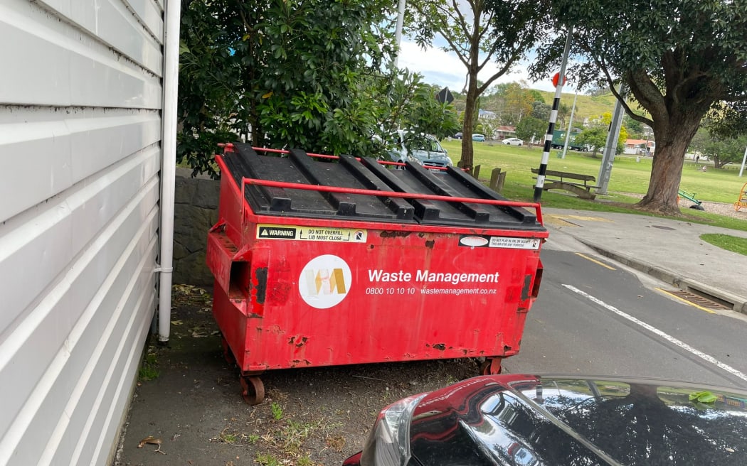 Waste Management bin behind the Vinnies Op shop in Mangere
