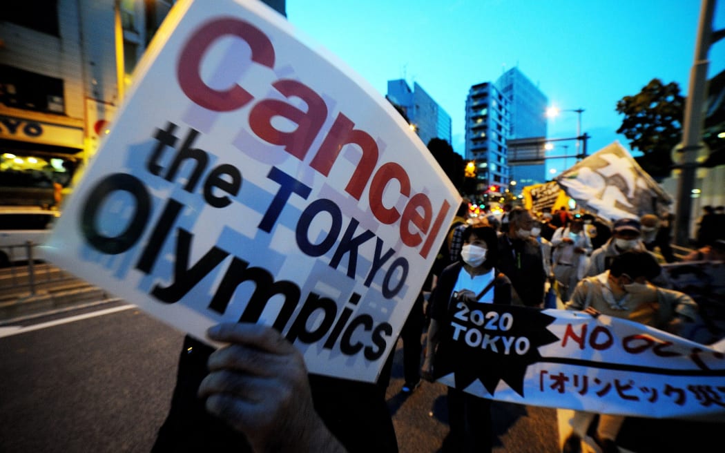 People stage a demonstration as they demand Tokyo Olympics to cancelled due to coronavirus pandemic in Tokyo, Japan on 9 May 2021.