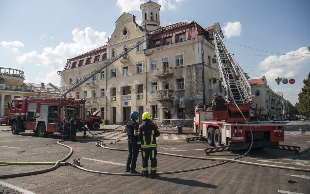 Rescuers  work at a site of a Russian missile strike, in Chernihiv, Ukraine August 19, 2023.