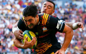 Luke Jacobson scores a try for the Chiefs in the Tens final.
