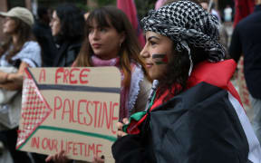 Palestinian supporters rally outside Ottawa City Hall.