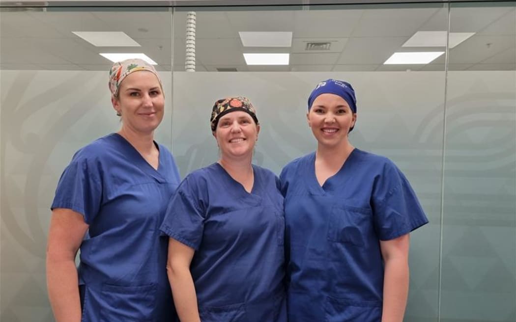 Waikato Hospital cardiothoracic nurse and surgical assistants Kelsey Abercrombie, Jacque Roberts, and Georgia Miller.