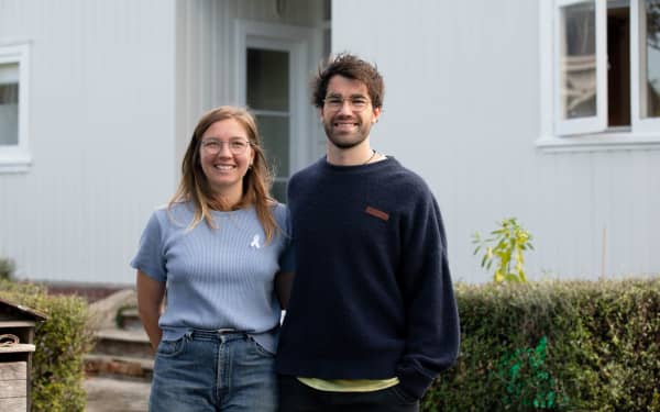 Soph Wagener, left, and her husband Jay Weir did a letterbox drop of the street prior to the lockdown