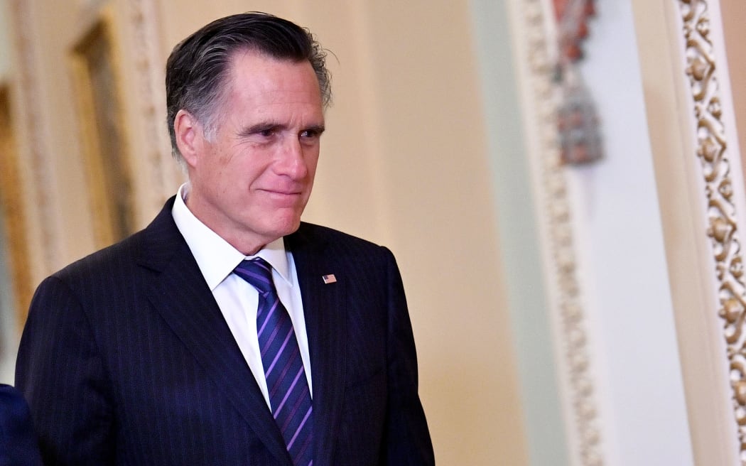 US Senator Mitt Romney (R-UT) is seen during a recess of the impeachment trial proceedings of US President Donald Trump on Capitol Hill January 30, 2020, in Washington, DC.