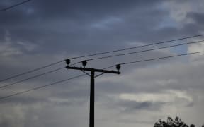 Powerlines on a cloudy sky