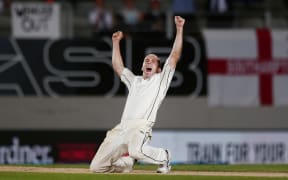 Todd Astle of New Zealand celebrates the final wicket of James Anderson of England to win the match. New Zealand Blackcaps v England. 1st day/night test match. Eden Park, Auckland, New Zealand. Day 5, Monday 26 March 2018. © Copyright Photo: Anthony Au-Yeung / www.photosport.nz