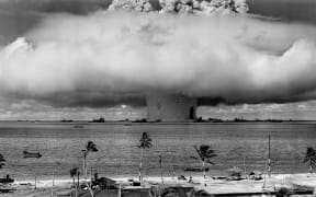 Mushroom-shaped cloud and water column from the underwater nuclear explosion of July 25, 1946, which was part of Operation Crossroads.