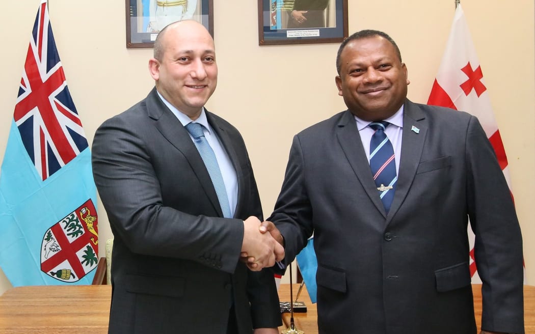 Fiji’s Minister for Defence, National Security and Foreign Affairs, Inia Seruiratu (R) and the Georgian Deputy Minister of Foreign Affairs, Alexander Khvtisiashvili
