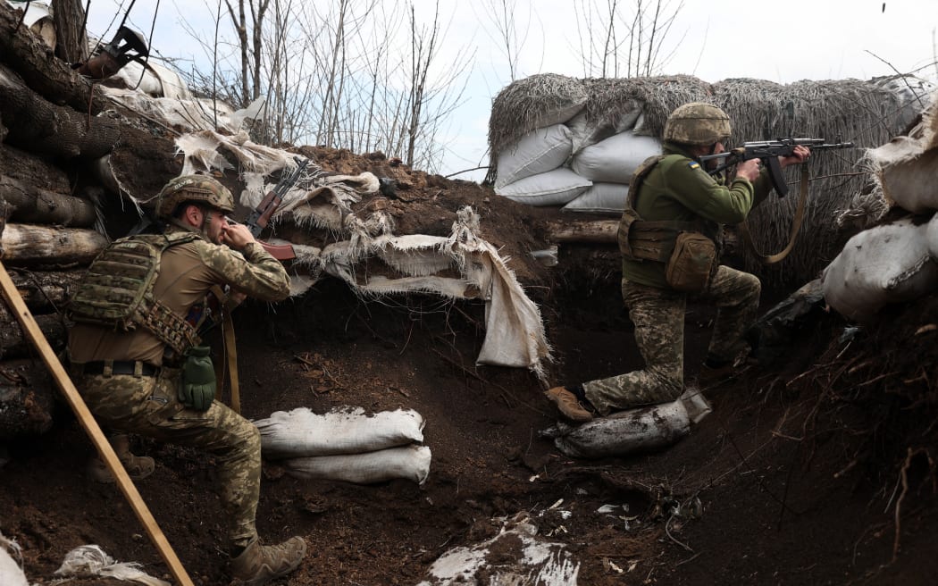 UKRAINE - RUSSIA CONFLICT 100 DAYS 100 PICTURES
AFP presents a selection of 100 pictures to mark 100 days of Russia's war in Ukraine

Ukrainian soldiers shoot with assault rifles in a trench on the front line with Russian troops in Lugansk region on April 11, 2022. (Photo by Anatolii STEPANOV / AFP) / UKRAINE - RUSSIA CONFLICT 100 DAYS 100 PICTURES