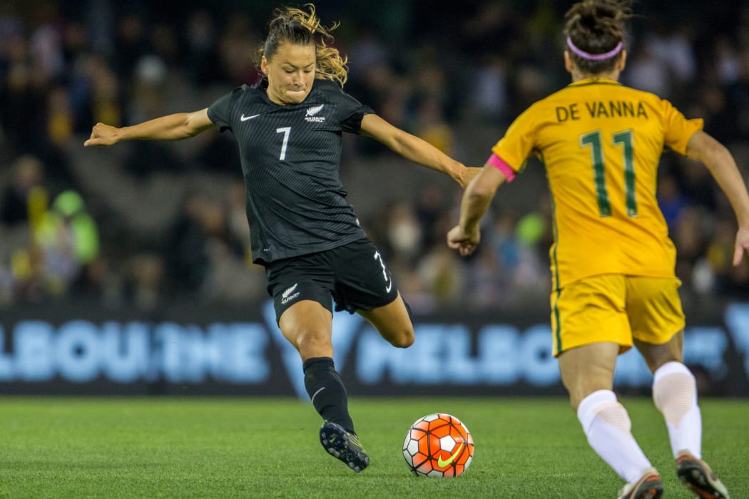 Ali Riley runs with the ball during during the Australia Matildas vs New Zealand Football Ferns womens football international at Etihad stadium Melbourne Australia on the the 7th of June 2016