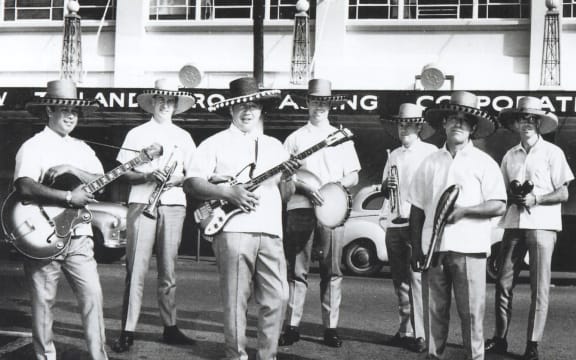 Nick Nicholson and the Neketini Brass outside the Christchurch NZBC studio, 1968.