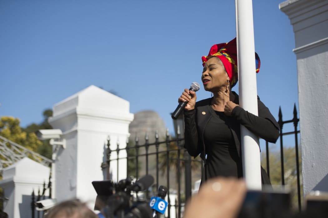 Professor Mamokgethi Phakeng, Vice-Chancellor of the University of Cape Town (UCT), speaks at a protest against abuse of women by men outside parliament in Cape Town.