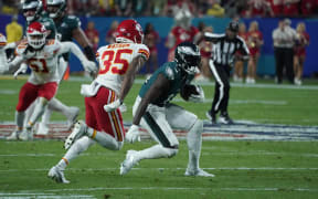 Kansas City Chiefs' cornerback Jaylen Watson blocks Philadelphia Eagles' wide receiver A.J. Brown during Super Bowl LVII between the Kansas City Chiefs and the Philadelphia Eagles at State Farm Stadium in Glendale, Arizona, on February 12, 2023. (Photo by TIMOTHY A. CLARY / AFP)