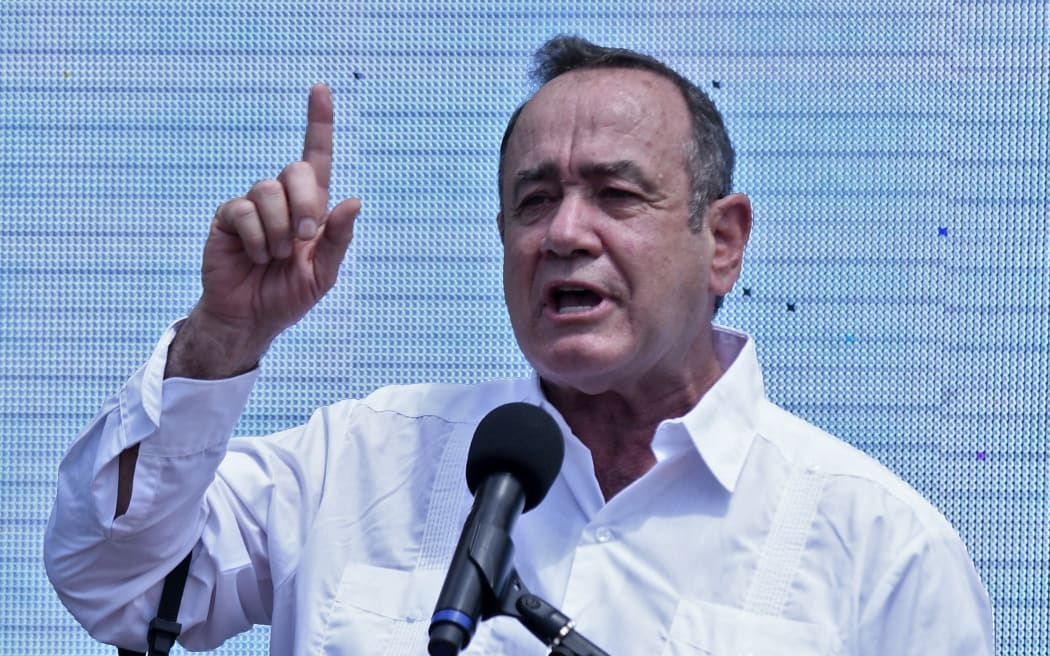 Guatemalan President Alejandro Giammattei delivers a speech during a ceremony outside the Culture Palace in Guatemala City on 9 March, 2022.