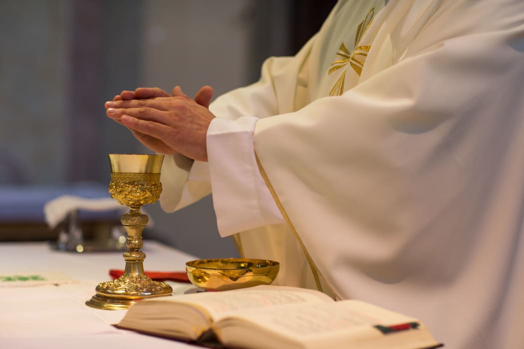 Priest during a wedding ceremony/nuptial mass
