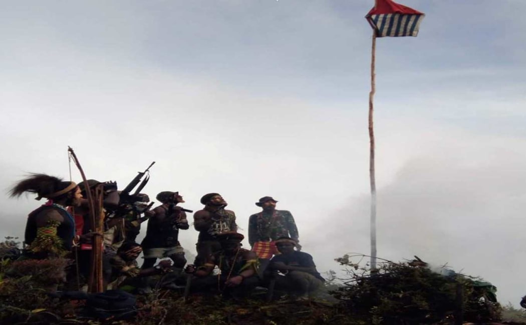 West Papua Liberation Army monitoring Indonesian military flyover in Nduga, 11 July 2018.