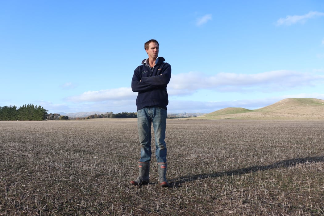 Simon White of Ludlow Farms in Ōtāne, Central Hawke’s Bay on a drought-stricken field which would usually see grass in March.