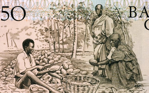 Men Splitting Cacao Pots on 50 Cedis 1980 Banknote from Ghana.