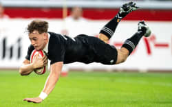 New Zealand’s Ruben Love scores a try during the rugby union test match between New Zealand and Japan at Nissan Stadium in Yokohama, Kanagawa prefecture, south of Tokyo on October 26, 2024. (Photo by Philip FONG / AFP)