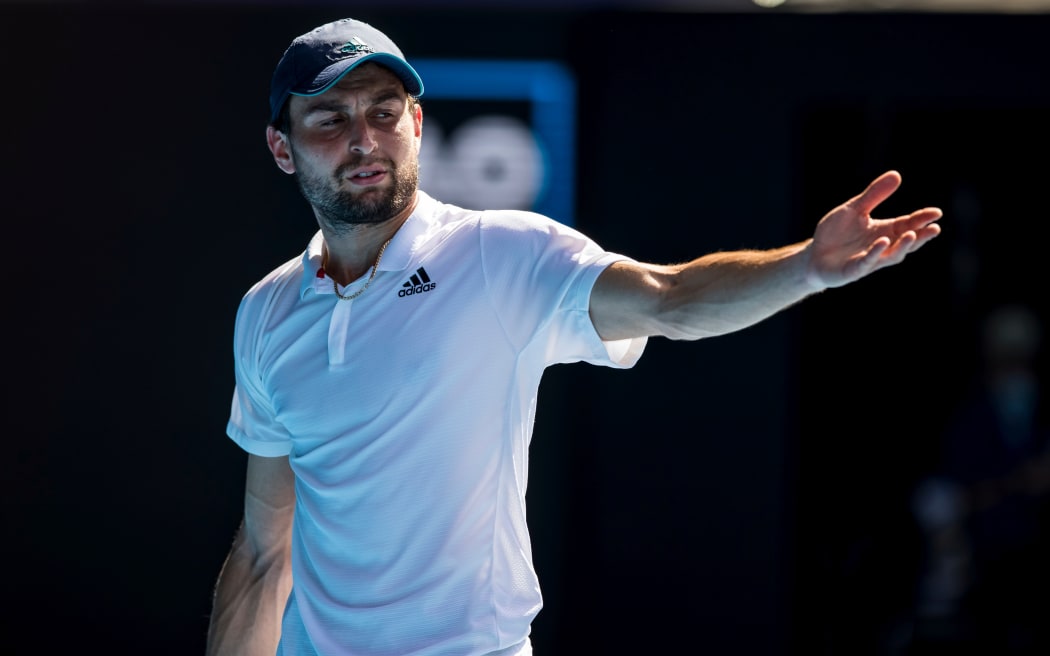 MELBOURNE, VIC - FEBRUARY 16: Aslan Karatsev of Russia shows his frustration after a contentious call during the quarterfinals of the 2021 Australian Open on February 16 2021, at Melbourne Park in Melbourne, Australia. (Photo by Jason Heidrich/Icon Sportswire)