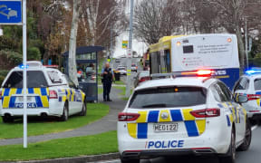 Armed police at a Tauranga bus stop