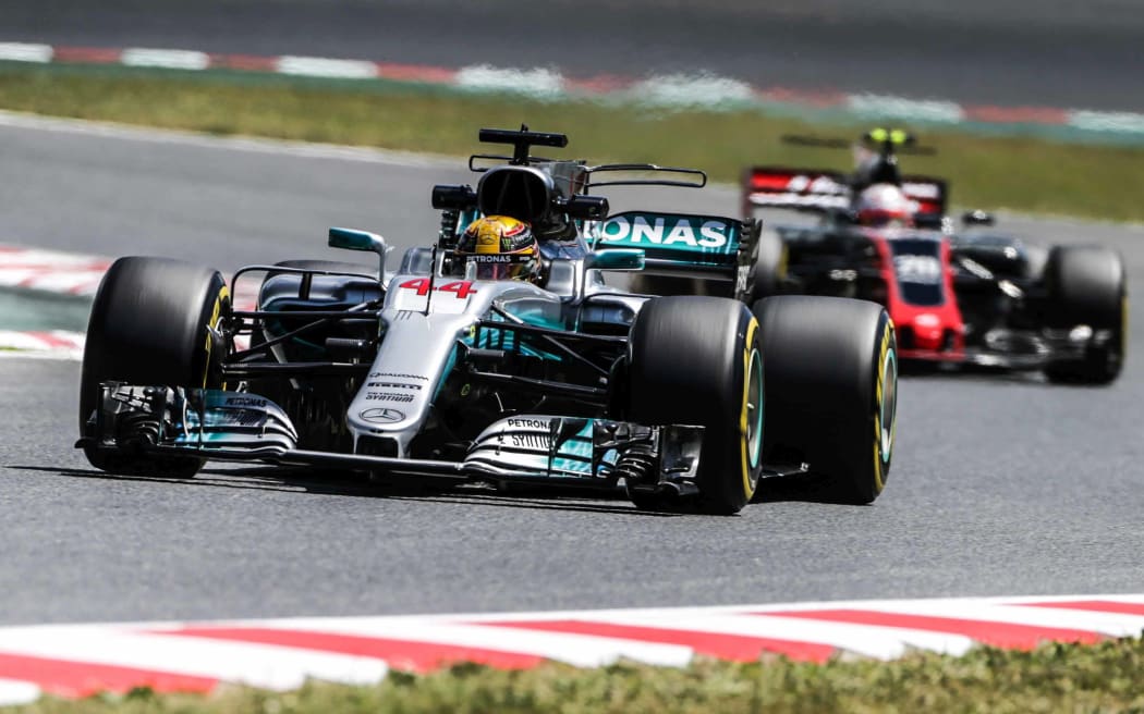 Lewis Hamilton powered to a dramatic win in Spain.