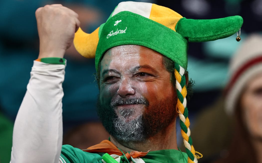 An Irish supporter cheers ahead of the France 2023 Rugby World Cup quarter-final match between Ireland and New Zealand at the Stade de France in Saint-Denis, on the outskirts of Paris, on October 14, 2023.