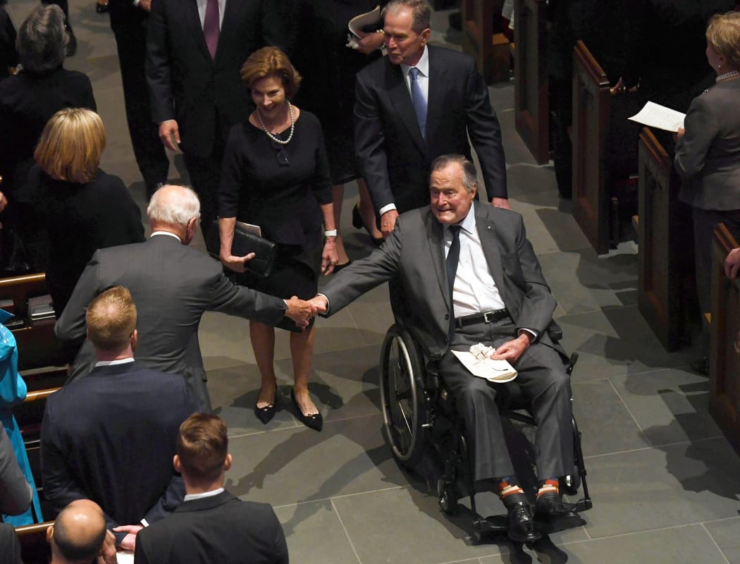 File photo of George H.W. Bush leaving the funeral of his wife Barbara Bush, followed by his daughter-in-law former  Laura Bush and former President George W. Bush.
