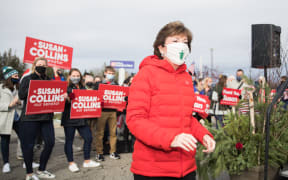Senator Susan Collins makes her way back to her campaign bus after announcing her competitor Sara Gideon called to concede on November 4, 2020 in Bangor, Maine.