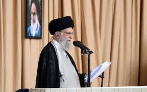 A handout picture provided by the Iranian Supreme Leader Ali Khamenei's office shows him speaking during the Friday prayer ceremony in Tehran on October 4, 2024. - Iran's supreme leader Ayatollah Ali Khamenei, delivering a rare Friday sermon in Arabic, defended this week's missile attack on Israel that deepened fears of a regional war and praised allies' defiance.