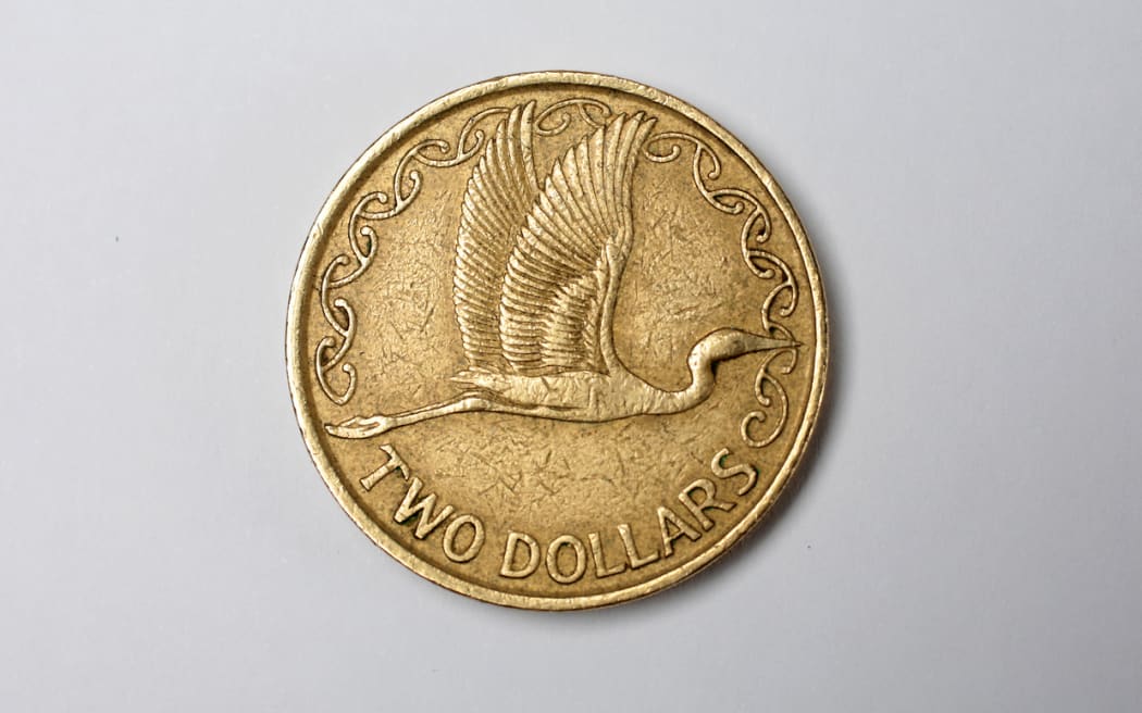 020514. Photo Diego Opatowski / RNZ. New Zealand money. Currency. Two dollars coins.