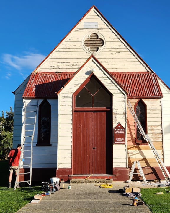 A fresh coat of paint on one side of the Kakanui Church.
An Otago couple have spent six years restoring a timber Presbyterian church in Kakanui, designed by architect Robert Arthur Lawson, which has now been recognised as a Category 1 historic place.