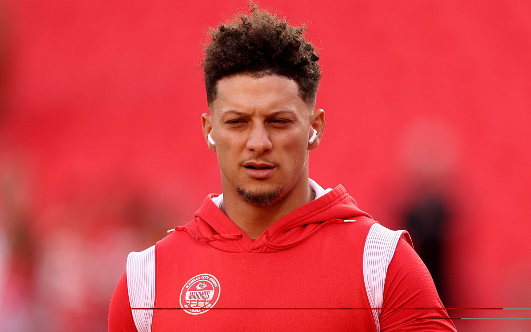 Patrick Mahomes #15 of the Kansas City Chiefs looks on before the game against the Denver Broncos at GEHA Field at Arrowhead Stadium on October 12, 2023 in Kansas City, Missouri.
