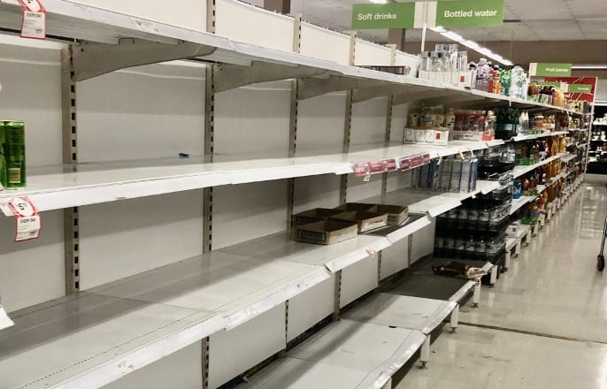Shelves where disinfectant wipes ,toilet tissues, bottled water, flu medicines are usually displayed are nearly empty at a  local store on March 03, 2020 in Rhodes area ,Sydney, Australia.