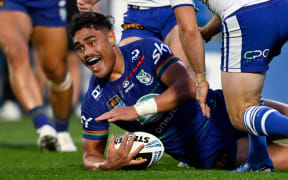 Jacob Laban scores a try for Warriors Reserves.
