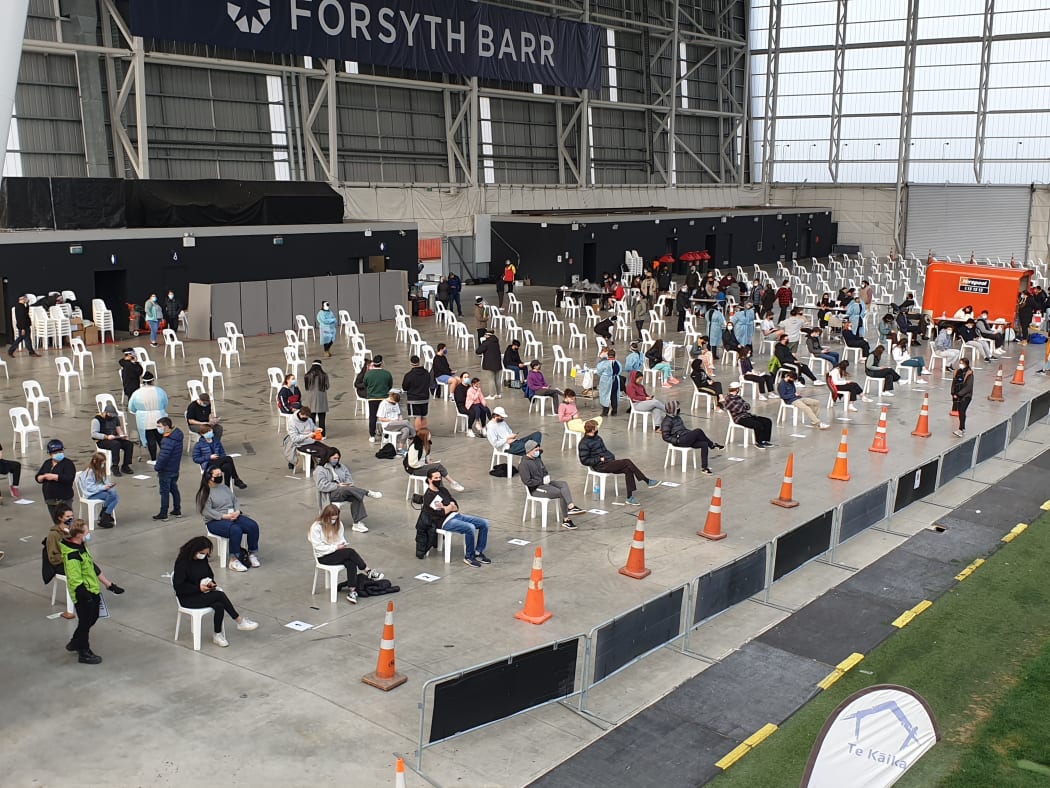 People wait at the vaccination clinic in Dunedin.